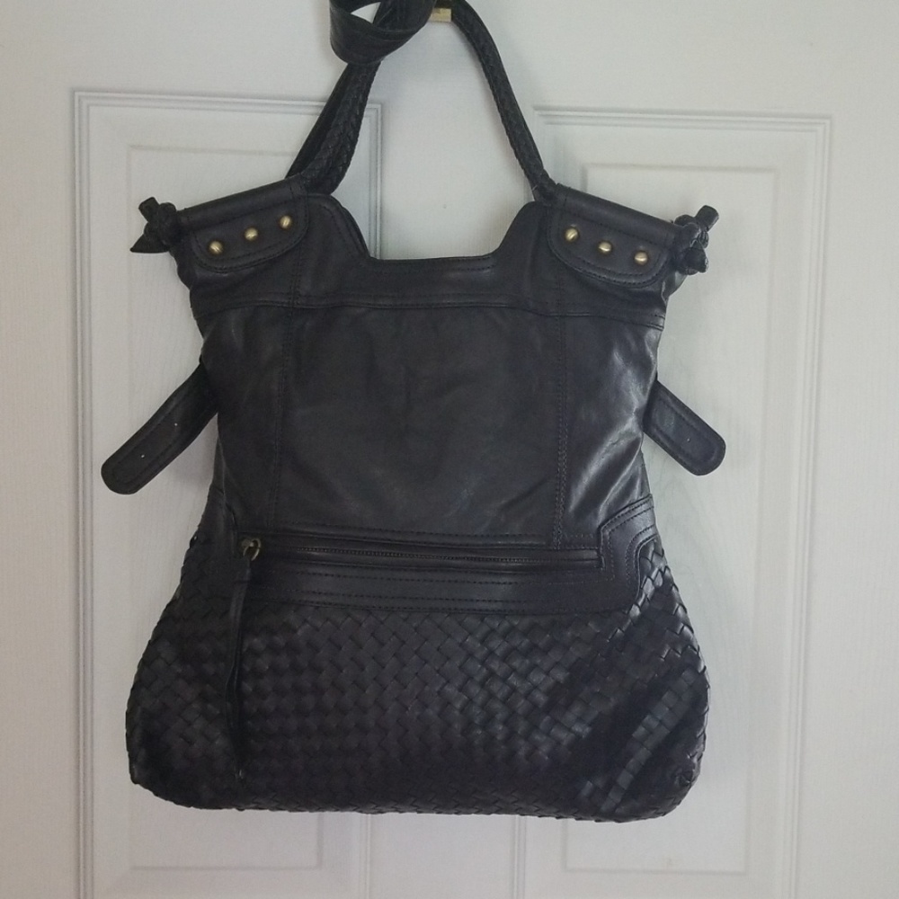Beautifully styled handbag  with braided handles